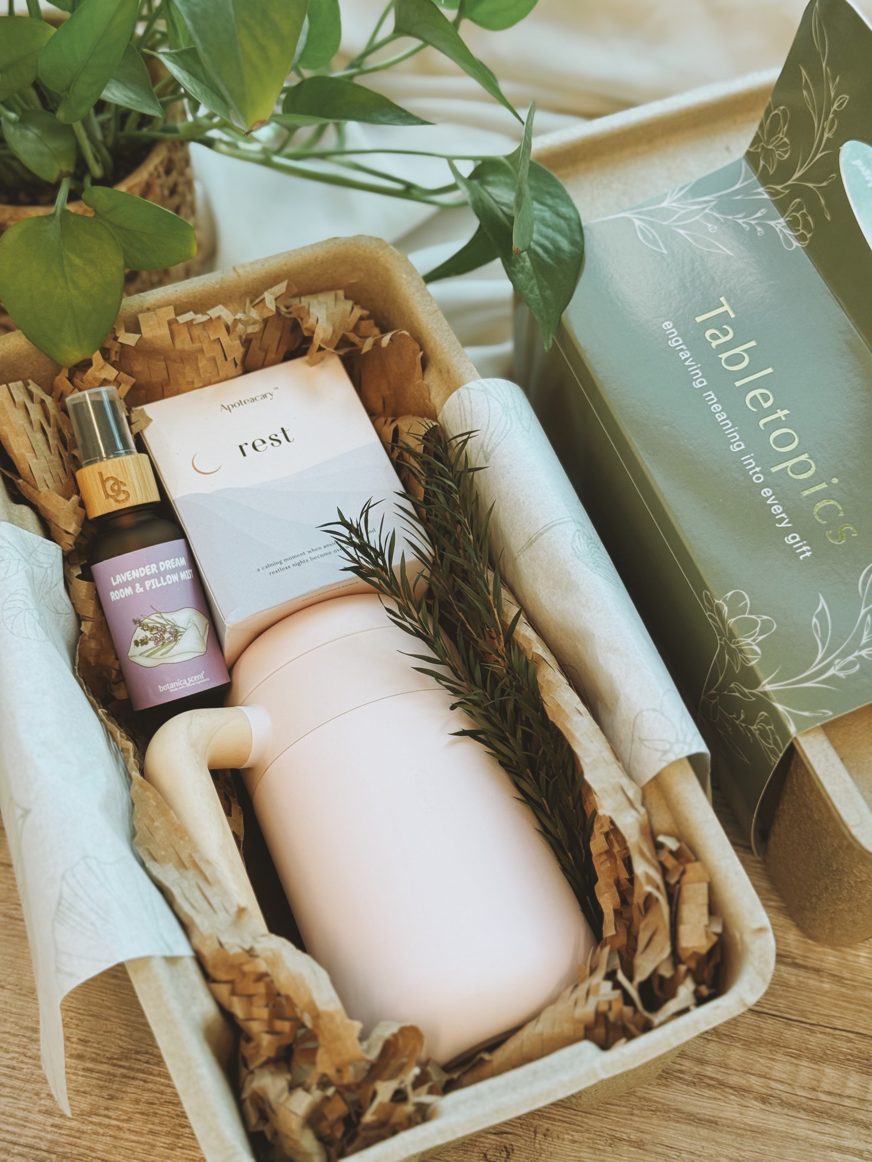 Her Gentle Hours Wellness bundle – Rest tea blend, customised Tisane mug, Lavender pillow mist, and engraved wooden letter in eco-friendly packaging.